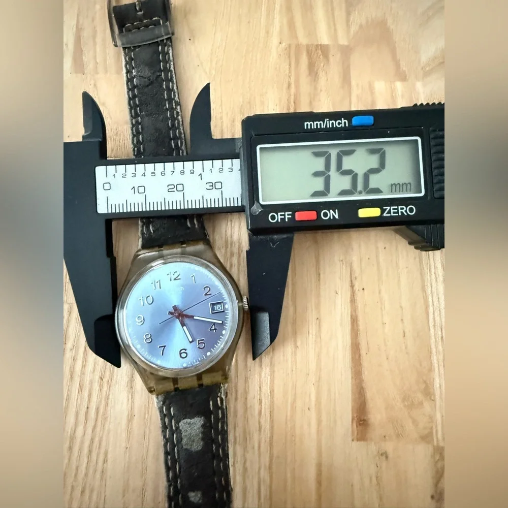 Swatch Blue dial brown strap, Blue Choco classic watch NEW BATTERY